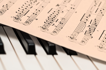 picture of piano keyboard with music